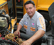 mechanic working on schoolbus